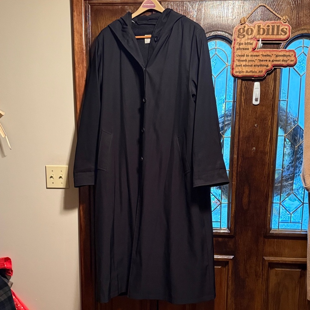 Jones New York Dark black lined coat with hood.